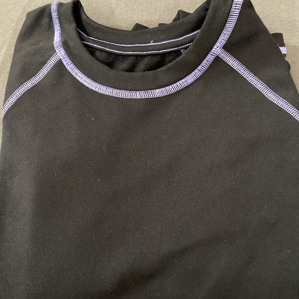 Black all in motion Long Sleeve Shirt with Purple Stitching size 6/6X NWOT